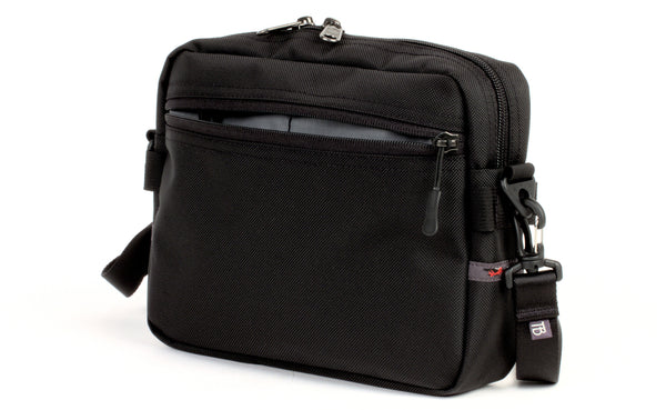 The Side Kick in Black 525 Ballistic with an Northwest Sky (grey with light grey grid) 210 Cerylon interior.